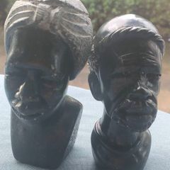 2x Tribal carved stone heads