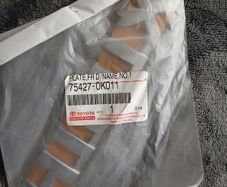 Genuine Toyota Hilux 2005-2012, Part 75427-0k011 (plate, Front Door Name)