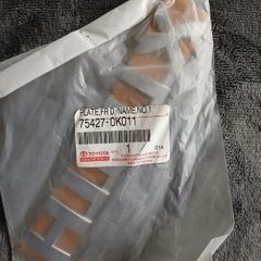 Genuine Toyota Hilux 2005-2012, Part 75427-0k011 (plate, Front Door Name)