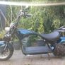 Fully Electric Chopper/Harley looks like a motorbike with matching side boxes Image 7