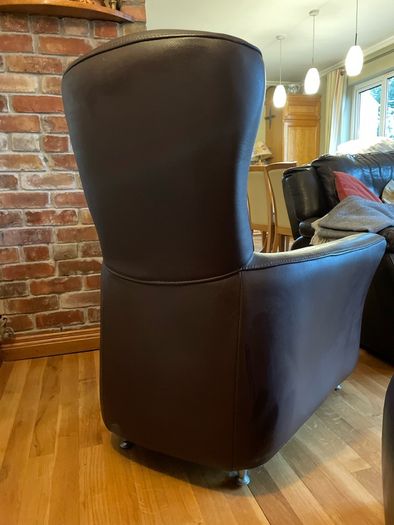 Real leather brown arm chair with foot stool