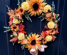 Autumnal sunflower and rose door wreath