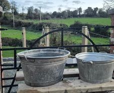 2 galvanised wash basin. One is 60 liter and one is about 40.