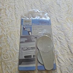 Car headlamp beam adapters. For driving in Europe. Collection only.