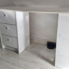 White desk with three drawers and side shelving