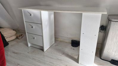 White desk with three drawers and side shelving