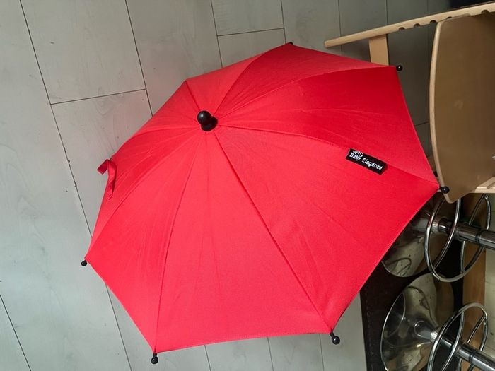 Red and green baby parasols