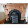 Timber surround with cast iron insert for fireplace Image 2