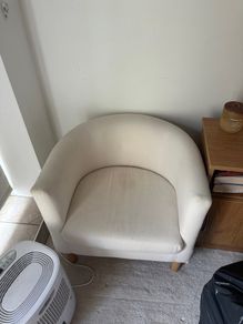 cream armchair