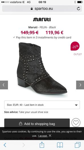 black leather Maruti ankle boots