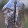 Meteorite 14.35 grams NWA 869 cut in 2 Image 2