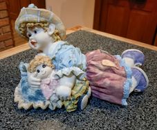 Lovely Figurine/ornament Of Child With Doll (used).