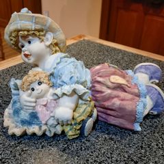 Lovely Figurine/ornament Of Child With Doll (used).
