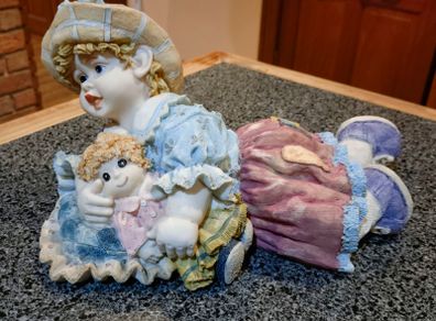 Lovely Figurine/ornament Of Child With Doll (used).