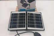 Small portable solar panel with leads for charging your phone (Brand New)