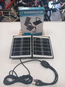 Small portable solar panel with leads for charging your phone (Brand New)