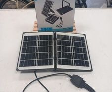 Small portable solar panel with leads for charging your phone (Brand New)