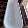 Cast iron bath with taps Image 2