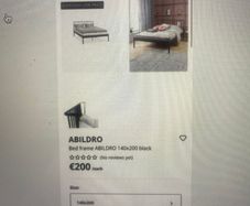 Black metal double bed frame