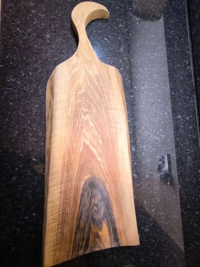 One piece of solid European Walnut, no glue, no joints. Hand-sanded and oiled with food-safe oi