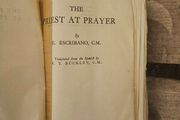 The Priest At Prayer. By E. Escribano. C. M. 1958 Leather Covered Hardback In Poor Condition.  See Photos For Same.