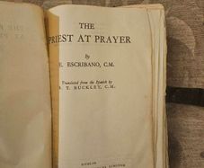 The Priest At Prayer. By E. Escribano. C. M. 1958 Leather Covered Hardback In Poor Condition.  See Photos For Same.