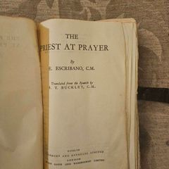 The Priest At Prayer. By E. Escribano. C. M. 1958 Leather Covered Hardback In Poor Condition.  See Photos For Same.
