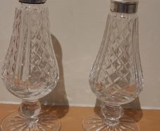Silver Lismore Waterford Crystal salt and pepper set. Silver tops