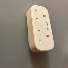 Two way UK plug with 2 USB sockets
