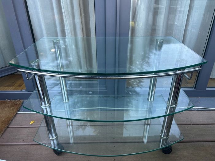 glass TV stand with wheels
