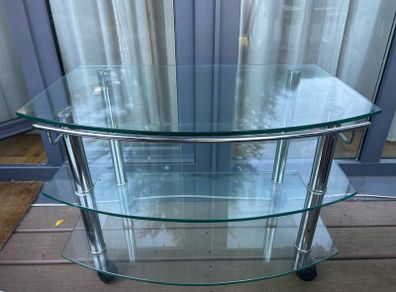 glass TV stand with wheels