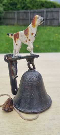 Vintage door bell with a dog figurine