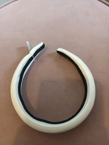 Cream satin hair band was 9.99