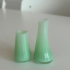 Two mini green glass vases