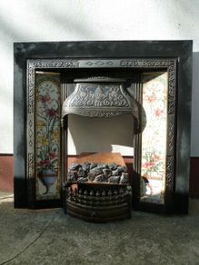 Old cast iron fireplace insert