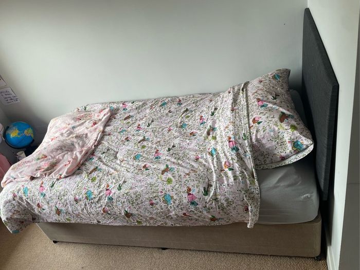 Single bed upholstered base and headboard