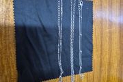 3 silver colour chains