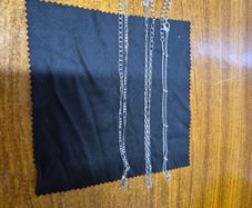 3 silver colour chains