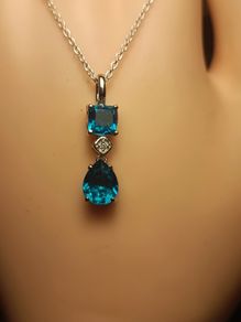 Rhodium Plated Sterling Silver Rare Capri Blue Quartz Pendant