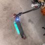 Nine bot e scooter with leds lights on the bottom of the frame. It's able to fold to make it easy to transport Image 4