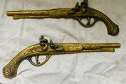solid brass gun set wall decor