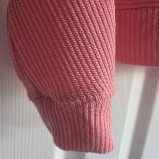 Pink long sleeve top cut back, size 10