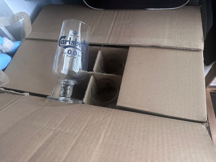 Box of stem Carlsberg pint glasses