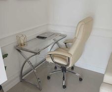 Glass Computer desk & cream leather office chair