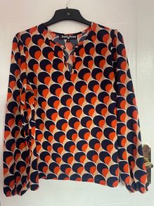 Orange and navy top