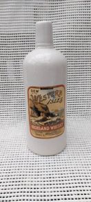 Dew of the western isles ,highland,,Train & McIntyre Ltd Glasgow whiskey jug/bottle ,see pictures for condition, sold as is ,,hard to come by, little damage chip on rim ,see pictures