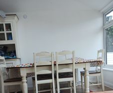 7ft farmhouse dining tabke and 6 chairs. Sine markings as well used over years. Very sturdy. Selling as downsizing.