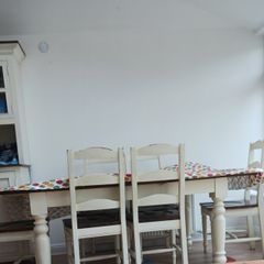 7ft farmhouse dining tabke and 6 chairs. Sine markings as well used over years. Very sturdy. Selling as downsizing.