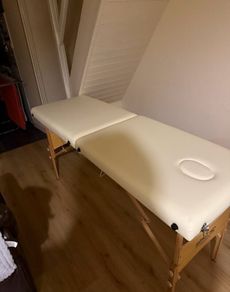 Massage table