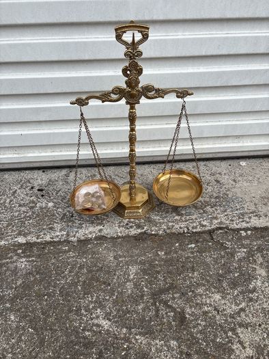 Ornate brass scales